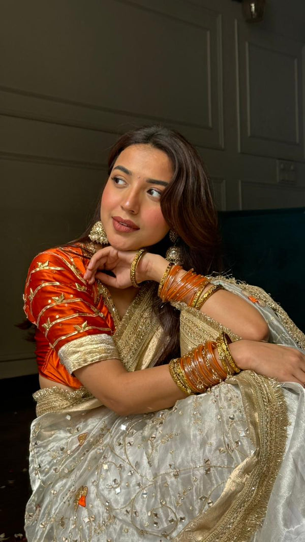 Hand-embroidered tissue silk saree